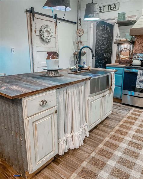 farmhouse rustic blue kitchen cabinets.